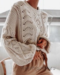 вязаный женский пуловер с ажурным узором